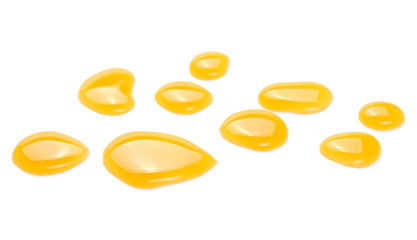 Puddle of orange juice isolated on white background, clipping path