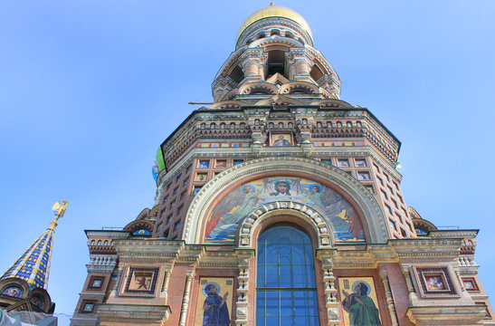 Church of Our Savior on Spilled Blood Architecture in Saint Petersburg, Russia. Religious Cathedral Close Up View with Ornamental Facade Details, Domes and Windows on Sunny Day Background.