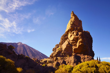 Fototapeta na wymiar View of Roques de Garcia rock and Pico del Teide volcano in the background in the Las Canadas caldera.Teide National Park, Tenerife,Canary Islands,Spain.