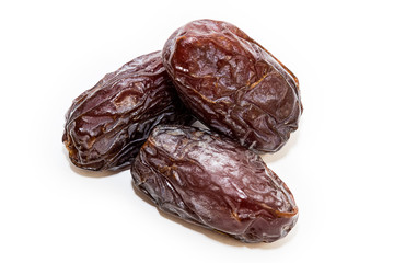 High quality dats on white background (fruits of date palm Phoenix dactylifera)