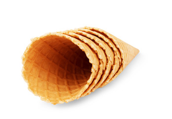 Delicious ice-cream cone on white background