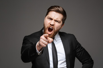 Portrait of a furious young businessman