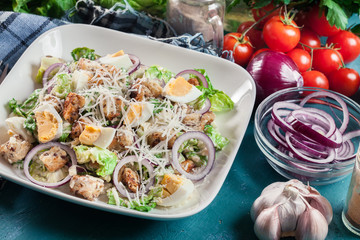 Healthy caesar salad with cheese, eggs and croutons