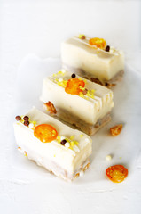 White cakes and two teaspoons for mother, woman or girlfriend on concrete background. Free space for your text.