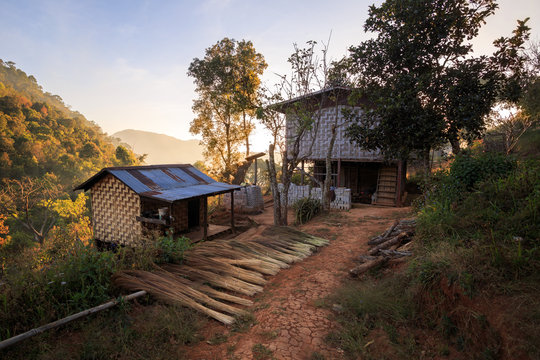 Basic home with no running water, electricity, or other modern conveniences outside a small village in the mountains in Shan State, Myanmar