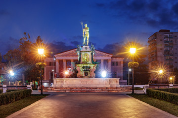 Neptune Monument and Ilya Chavchavadze State Drama Theatre during blue hour in Batumi, Adjara, Georgia