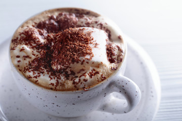 Hot chocolate and marshmallow sprinkled with chocolate chips.