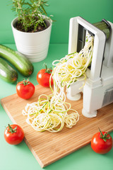 spiralizing courgette raw vegetable with spiralizer