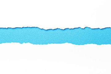 Ripped white paper with colored background with space for text