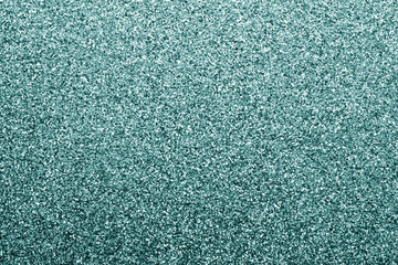 Glittering background in cyan tone.