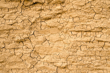 texture background abstract clay wall in cracks