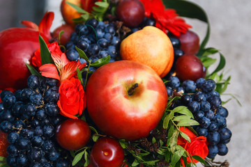 Obraz na płótnie Canvas fruit basket with apples, grapes and cherries