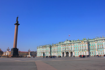Fototapeta na wymiar Palace Square Historic Architecture with Winter Palace Building and Alexander Column in St. Petersburg, Russia. Main City Square Summer Scene, Famous Travel Landmark on Blue Sky Sunny Day Background.