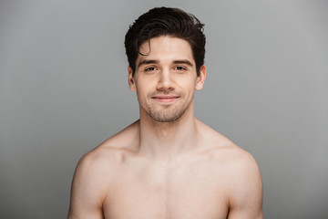 Beauty portrait of half naked smiling young man
