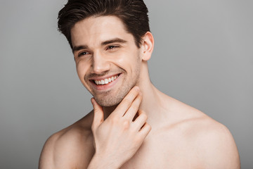 Close up beauty portrait of half naked laughing man
