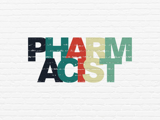 Medicine concept: Painted multicolor text Pharmacist on White Brick wall background