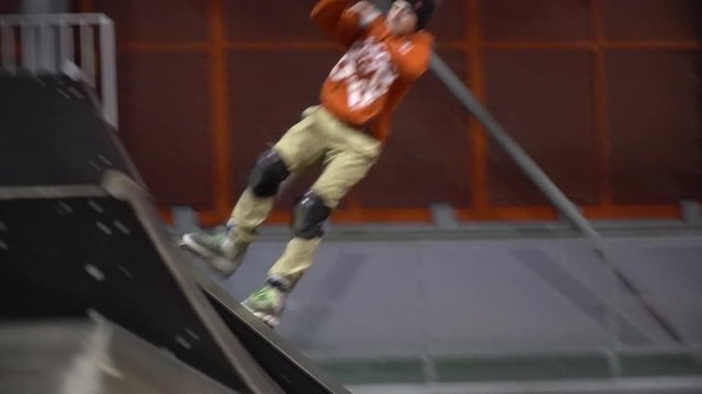 Men take turns on the ramp at the first man turned out and the second is not, montage