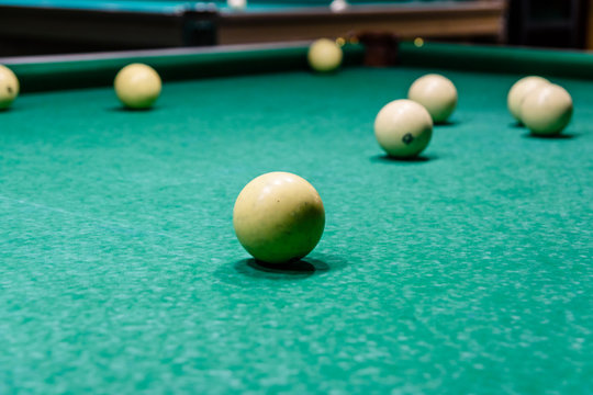 Balls on the green cloth. Russian billiard