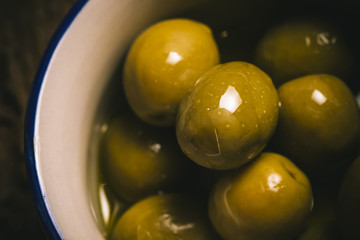 Appetizing green salted olives
