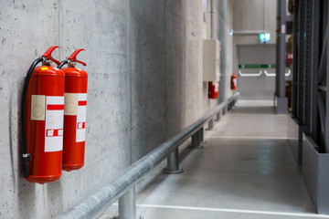 Fire extinguishers in the warehouse. Fire safety - obrazy, fototapety, plakaty