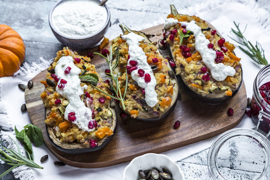 Filled aubergine, bulgur, pumpkin, pomegranate, zucchini, rosemary, tzatziki, mint, vegetables