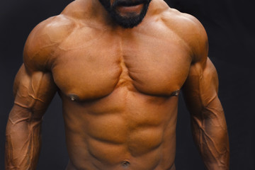 Fototapeta premium PUNE, MAHARASHTRA, INDIA, 29th March 2018, Young man front possing body show during Indian Body Builders Association show, Balewadi, Baner