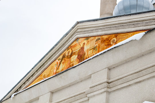 Troitskoe, Russia - August 2017: The Church of the Trinity of the Life-giving, antique fresco on the facade
