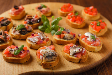 Mix Bruschetta with sardines and anchovies.
