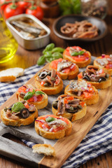 Mix Bruschetta with sardines and anchovies.