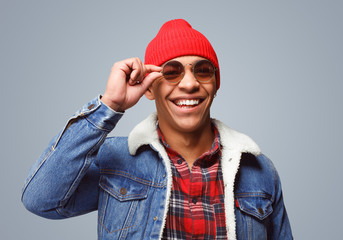 Smiling handsome guy in sunglasses