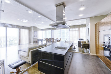 Modern interior in a new luxury house with panoramic windows.