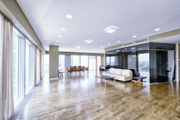 Modern interior in a new luxury house with panoramic windows.