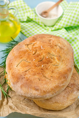 Bread focaccia of potato dough with sea salt and rosemary