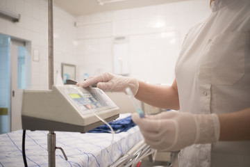 doctor with an infusion in the hospital, intensive care unit