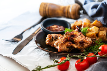 roasted sleeves chicken with potatoes and barbecue sauce