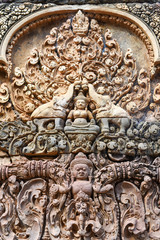 Fototapeta na wymiar Banteay Srei temple close-up carving, Cambodia