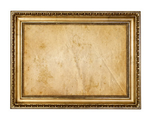 Old parchment paper in vintage rustic wood frame isolated on white background.