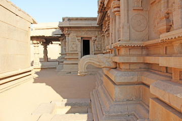 Carving details on the outer wall of Hazara Rama Temple. Hampi, Karnataka, UNESCO. Indian God...