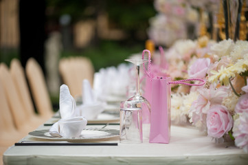 Wedding decoration with flowers on a table outdoors
