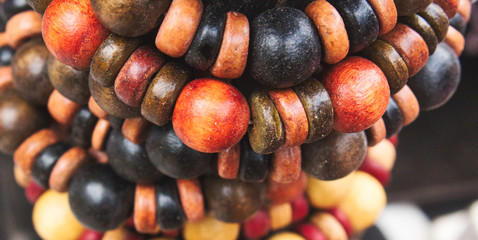 Coloured artisan wooden bead bracelets on display as ethnic jewellery