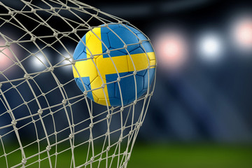 Naklejka premium Swedish soccerball in net