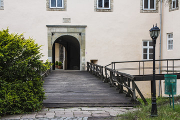 Naklejka na ściany i meble Wooden bridge leading to the entrance to the Uzhhorod castle. Ukraine