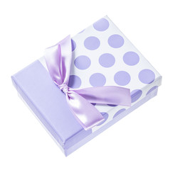 Purple wrapped present box isolated on white