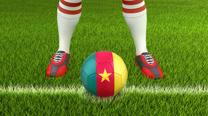 Fototapeta na wymiar Man and soccer ball with Cameroon flag 