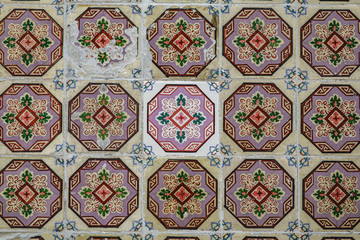 Tiles with different age in Lisbon facade