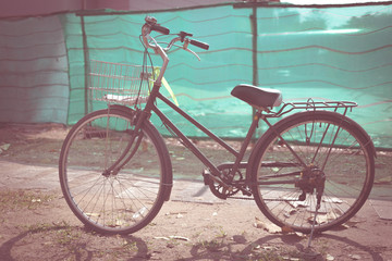 Fototapeta na wymiar Black vintage bicycle on the sand