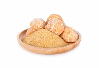 unbleached sugar and palm sugar in wooden plate on white background