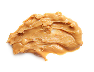 Creamy peanut butter on white background