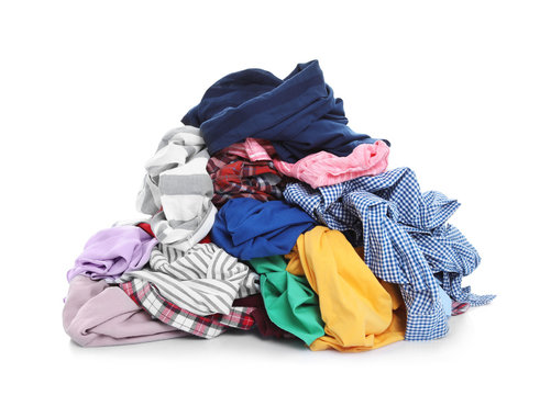 Pile of dirty clothes on white background