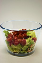 vegetable salad in a bowl on a white background